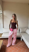 PANTALONE POIS ROSA