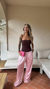 PANTALONE POIS ROSA