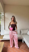 PANTALONE POIS ROSA